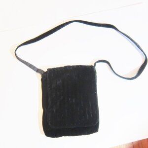 Black striped Kenneth Cole foldover bag, with zippered inside pocket